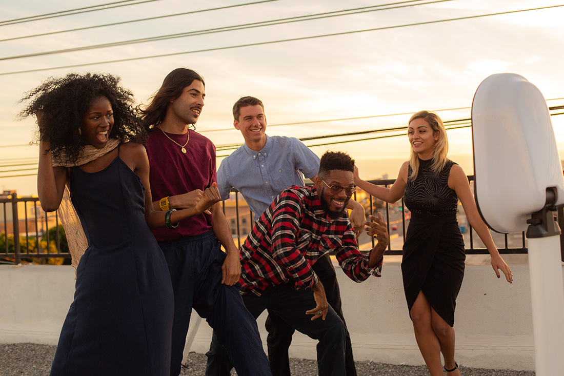 group photo of people using the photo booth