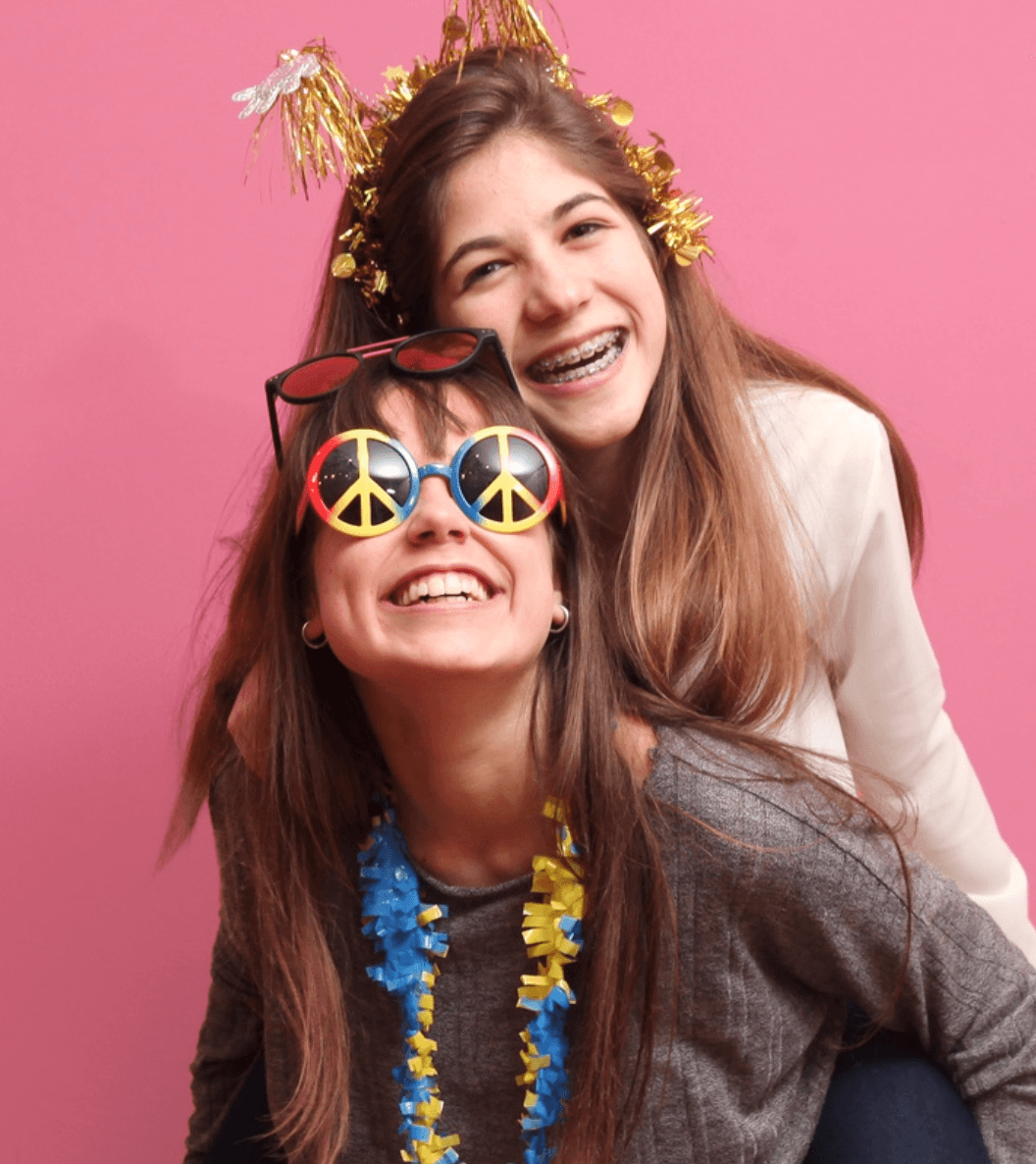 two women taking a photo